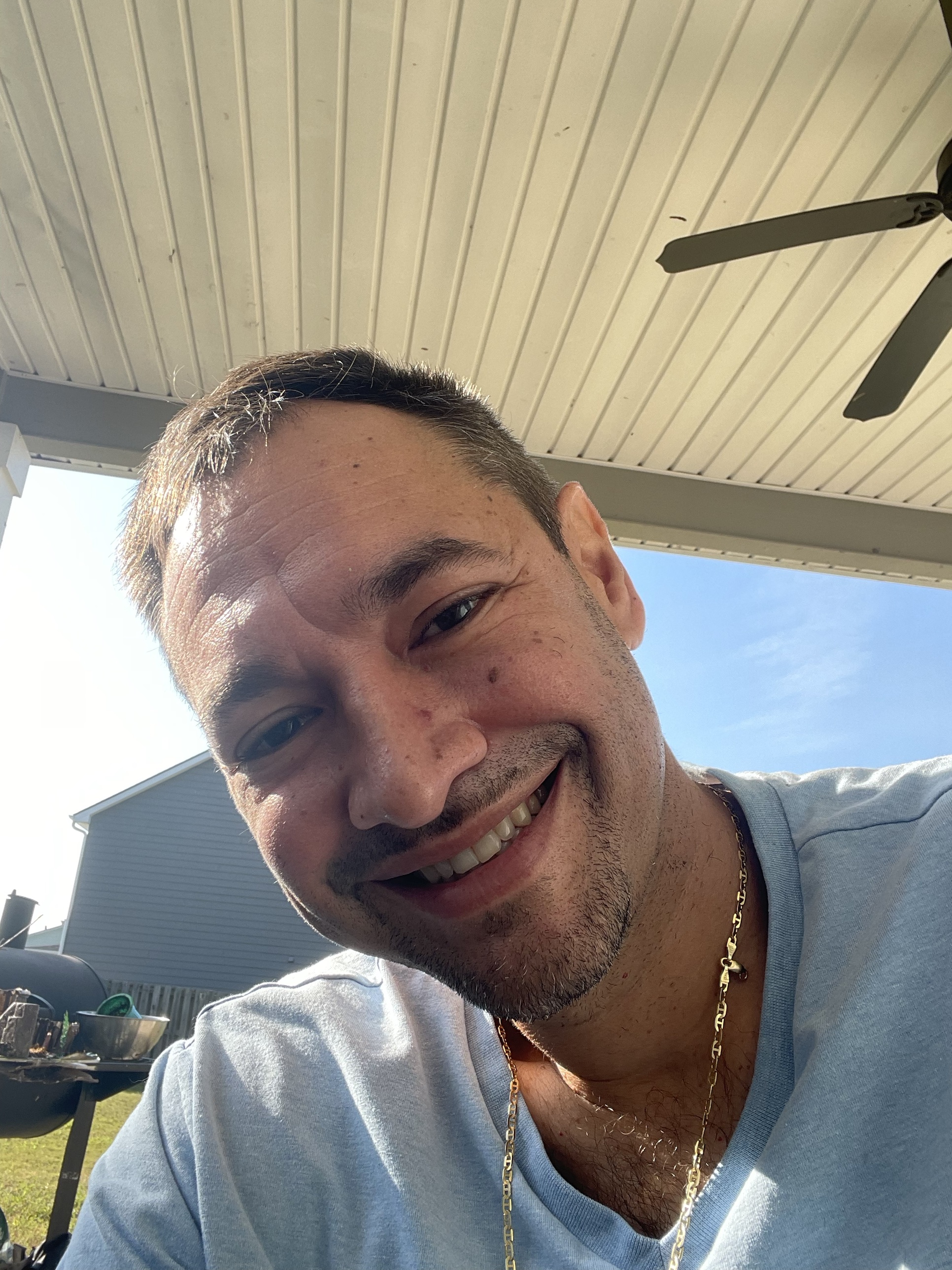 Hector Guerrero smiling outdoors